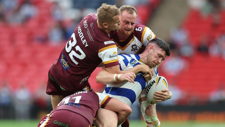 Batley Bulldogs v Halifax Panthers - AB Sundecks 1895 Cup - Final - Wembley
Batley Bulldogs� Dane Manning (left) Luke Hooley (second left) and Josh Woods tackle Halifax Panthers� Zack McComb during the AB Sundecks 1895 Cup final at Wembley, London. Picture date: Saturday August 12, 2023.