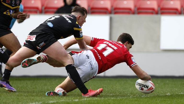 Salford Red Devils' Sam Stone scores their side's first try of the game during the Betfred Super League match at the Salford Community Stadium, Salford. Picture date: Sunday February 25, 2024.